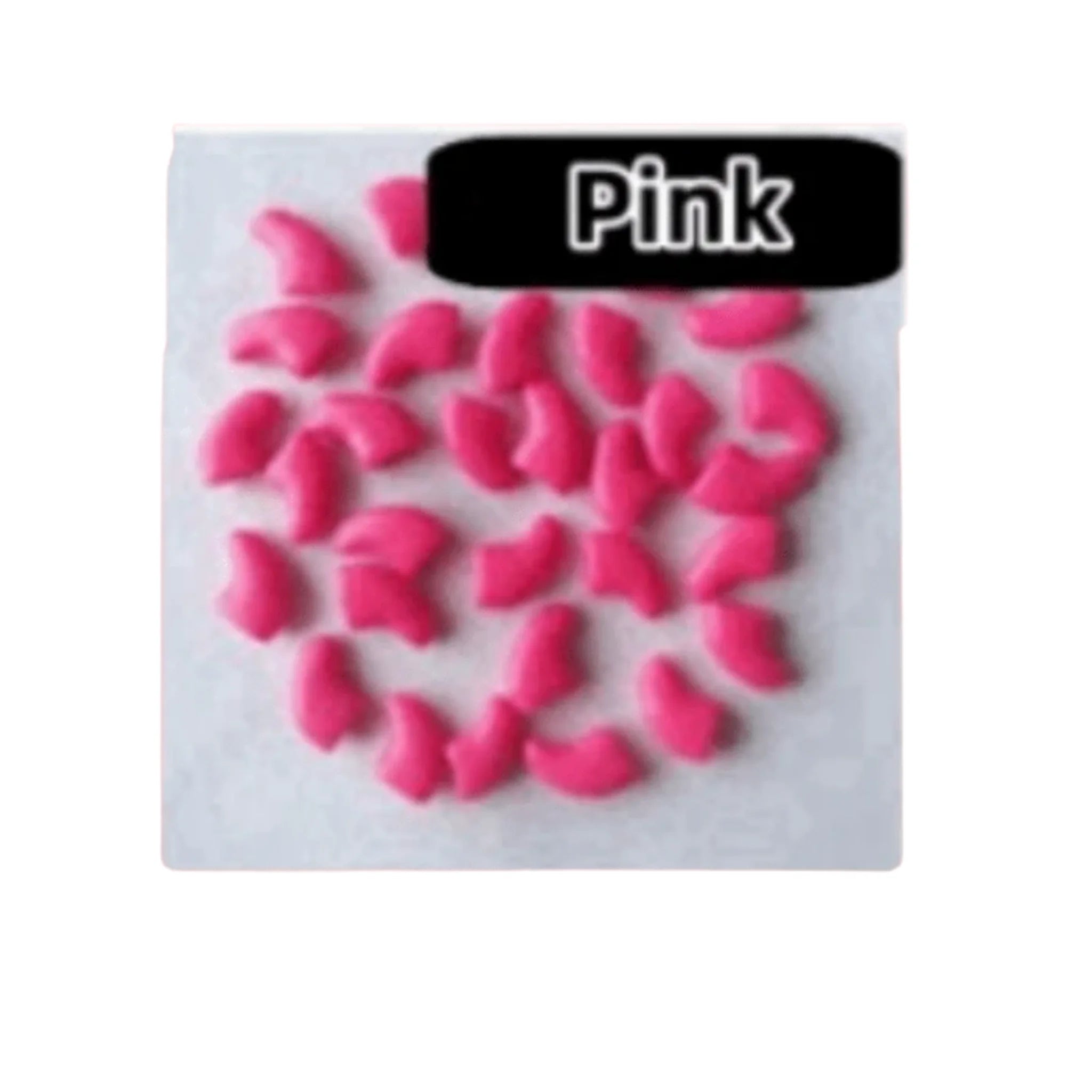 Pink pet nail covers on a white towel, pet product
